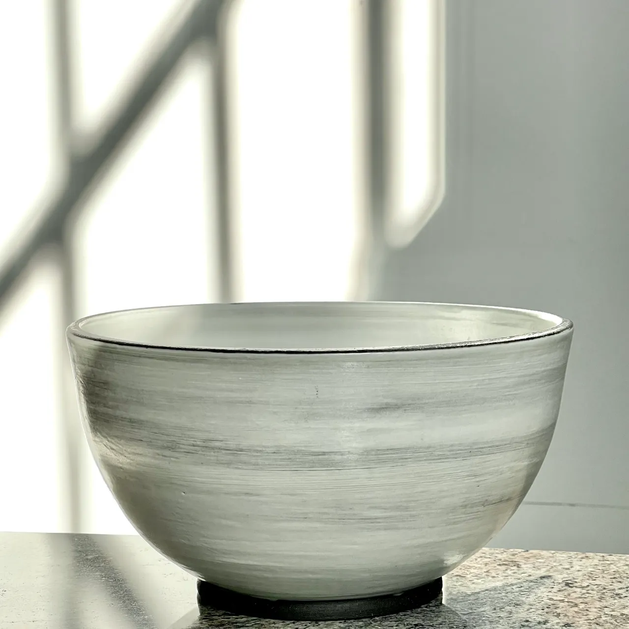 A bowl sitting on top of a table.