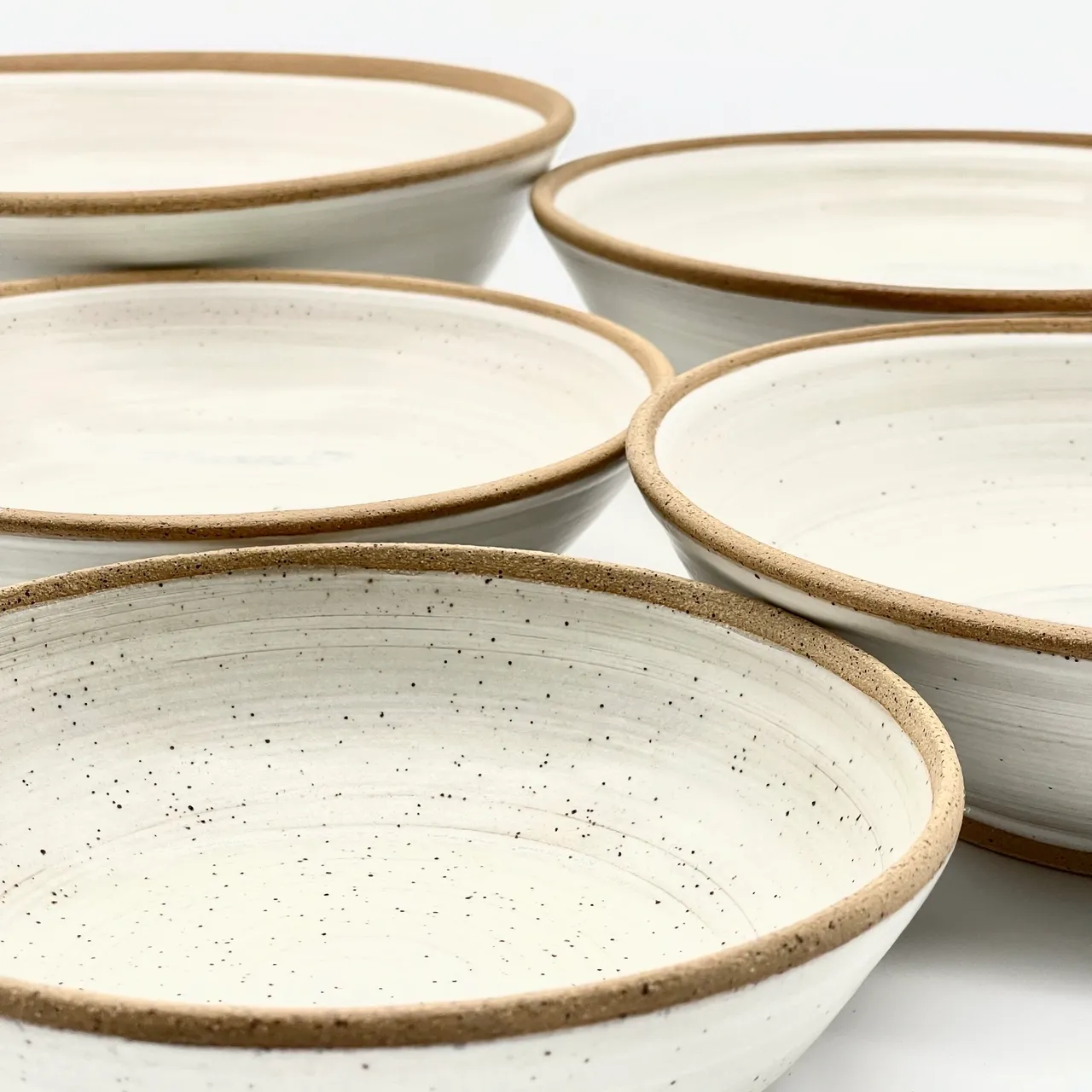 A group of bowls sitting on top of each other.